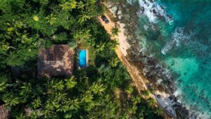 Aerial,View,Of,A,Villa,With,A,Swimming,Pool,In