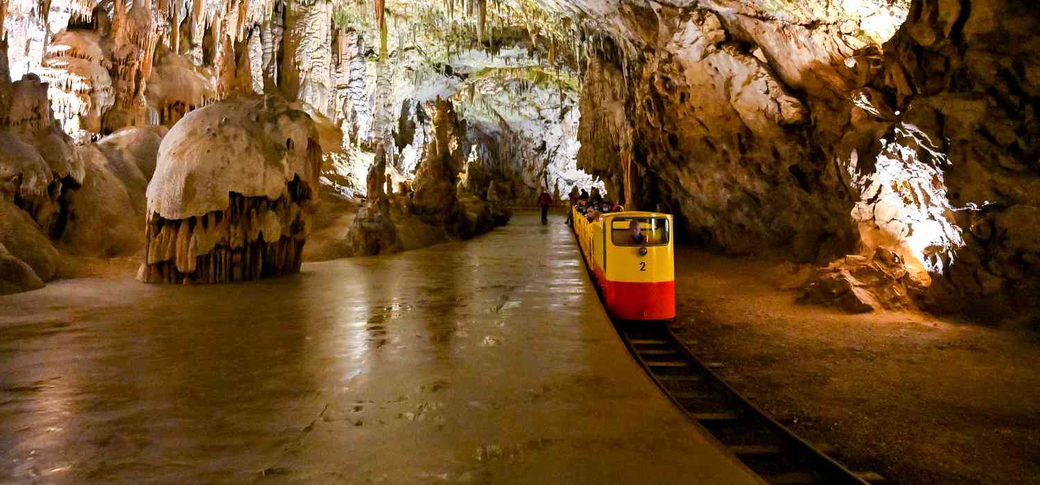Underground tourist train in Postojna cave, Slovenia. It is the